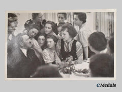 Germany, Third Reich. A Candid Photograph of AH with Female Supporters, from the Hoffmann Studio