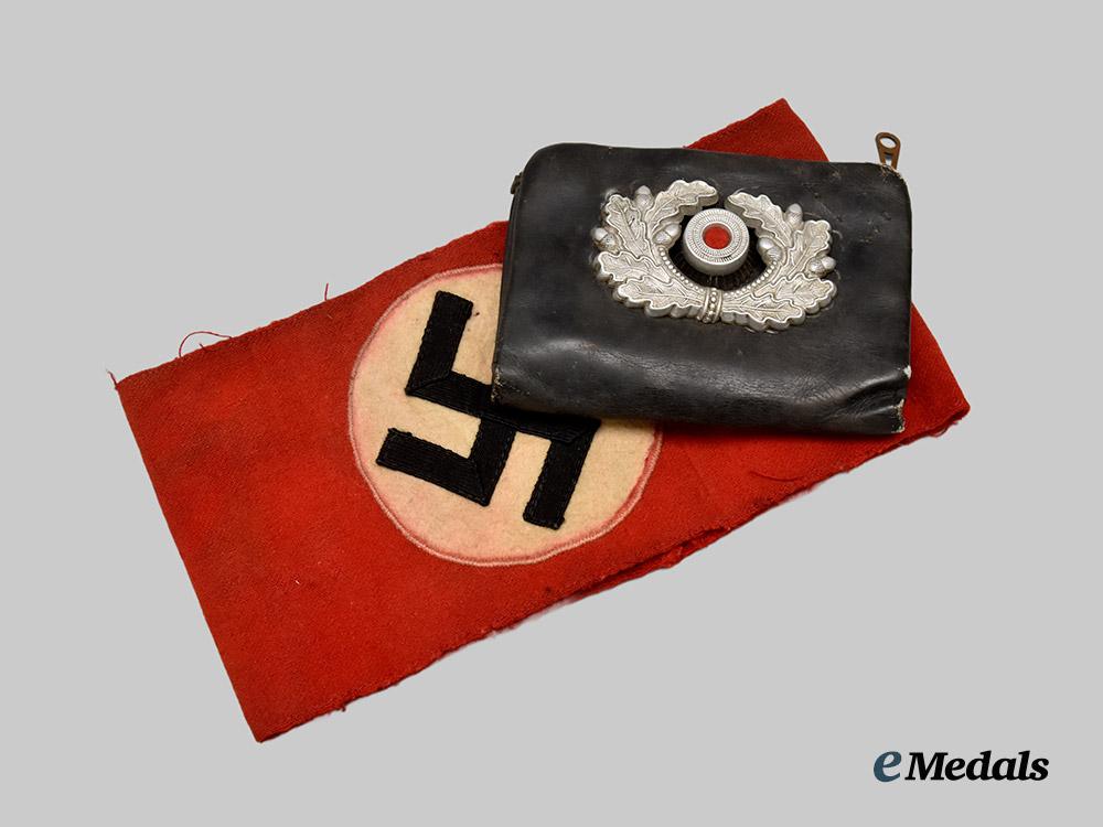 germany,_third_reich._a_party_member’s_armband,_with_supporter’s_wallet___m_n_c8141