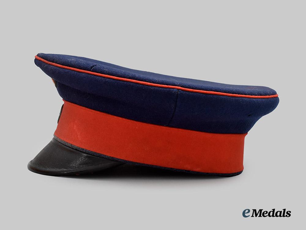 germany,_imperial._a_prussian_infantry_dark_blue_visor_cap,_named_and_unit-_attributed_example,_by_carl_rauschke___m_n_c8234