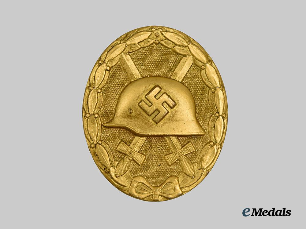 germany,_wehrmacht._a_gold_grade_wound_badge,_with_case_and_stick_pin_miniature,_by_the_vienna_mint___m_n_c8356