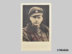 Germany, SS. A Rare Wartime Signed Photo of Panzer Ace Michael Wittmann