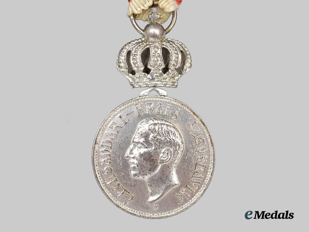 yugoslavia,_kingdom._a_royal_household_medal_of_king_alexander_i_karadordevic,_in_silver___m_n_c9087