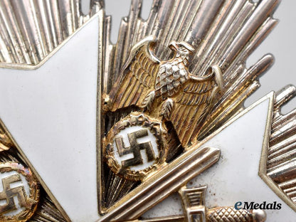 germany,_third_reich._a_rare_order_of_the_german_eagle,_grand_cross_with_swords_set_with_case,_by_gebrüder_godet___m_n_c9421