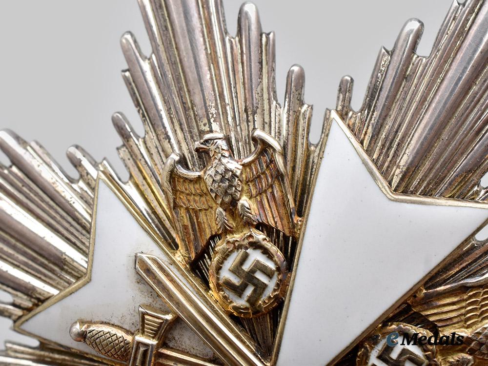 germany,_third_reich._a_rare_order_of_the_german_eagle,_grand_cross_with_swords_set_with_case,_by_gebrüder_godet___m_n_c9423