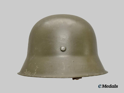 international._a_lot_of_german_and_an_american_steel_helmets___m_n_c9444