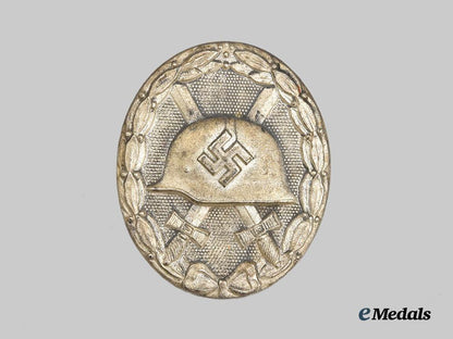 germany,_wehrmacht._a_silver_grade_wound_badge,_with_case,_by_josef_rückert&_sohn___m_n_c9750