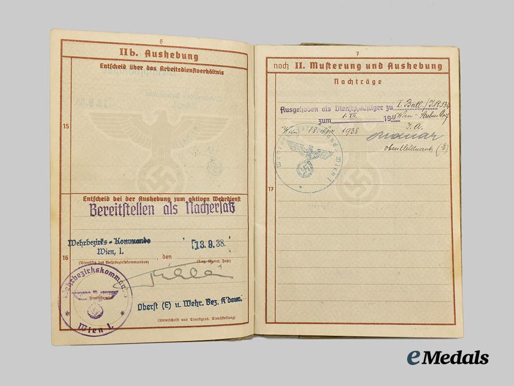 germany,_heer._a_pair_of_wehrpässe,_gebirgsjäger_and_decorated_multi-_front_service___m_n_c9809