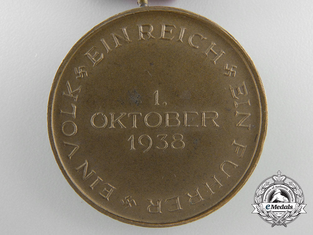 a_commemorative_medal_for1._october1938_with_case_of_issue_a_1900