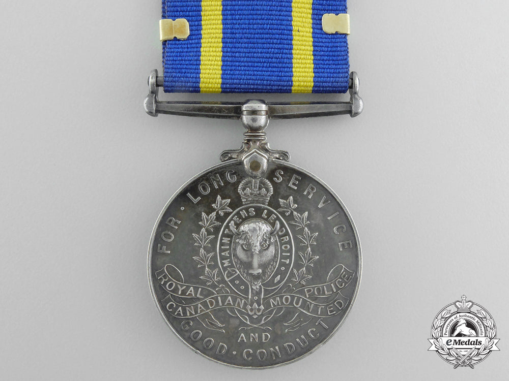 A Royal Canadian Mounted Police Long Service Medal With Three Star Cla ...