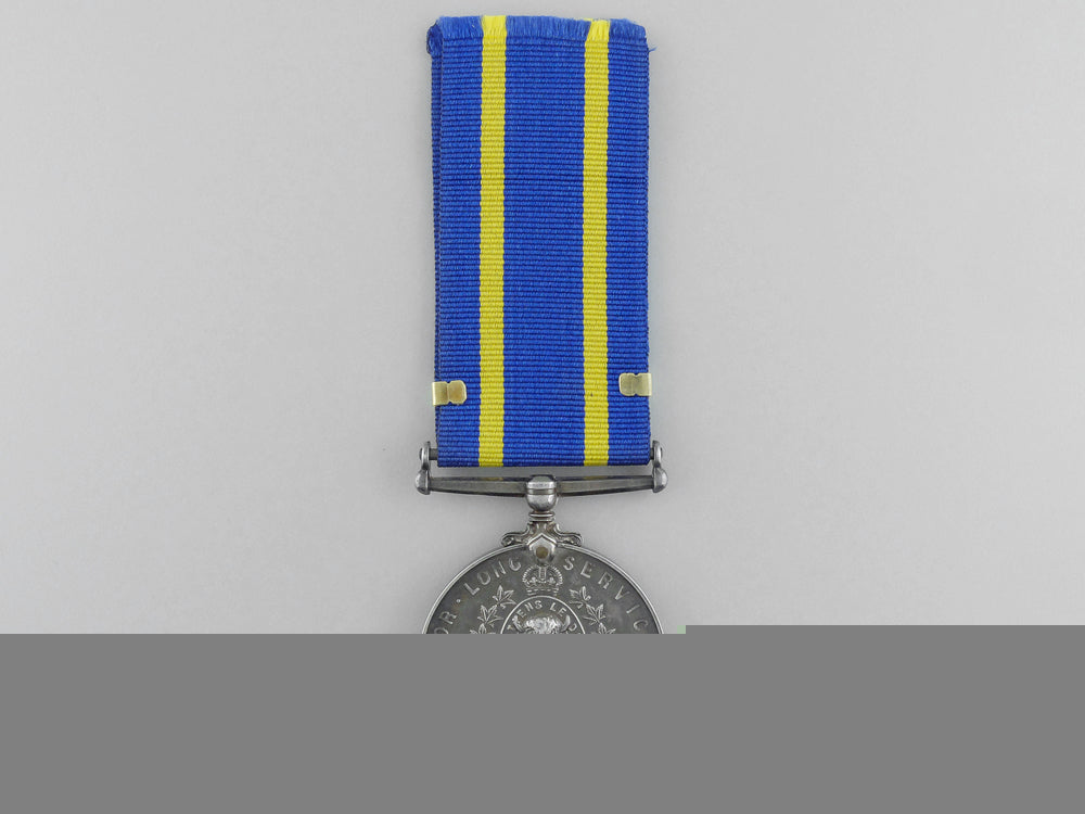 A Royal Canadian Mounted Police Long Service Medal With Three Star Cla ...