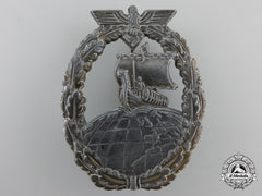 A Kriegsmarine Naval Auxiliary Cruiser Badge By Friedrich Orth
