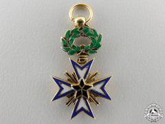 A Miniature French Colonial Order Of The Black Star Of Benin In Gold