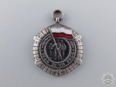 A Miniature Polish Medal For The Tenth Year Of The People's Republic 1944-1954