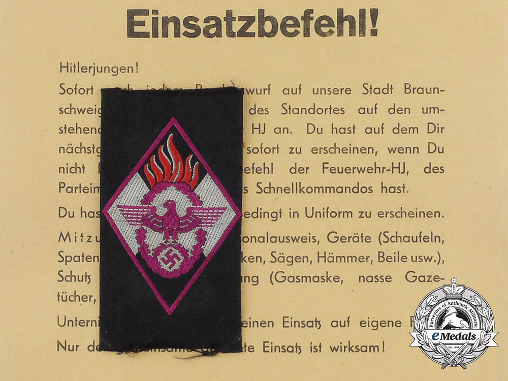 an_hj_fire_defense_badge_with_award_document_aa_0244