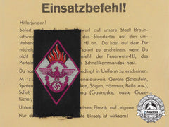 An Hj Fire Defense Badge With Award Document