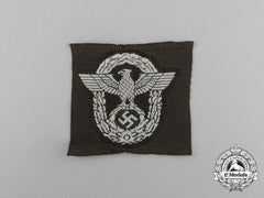 A Mint And Unissued Eastern People’s Police M43 Overseas Cap Insignia