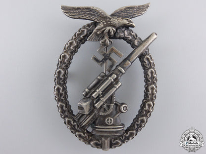 an_early_luftwaffe_flak_badge_in_tombac_an_early_luftwaf_559aa2799b061