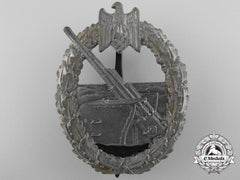 A Kriegsmarine Coastal Artillery Badge By Juncker