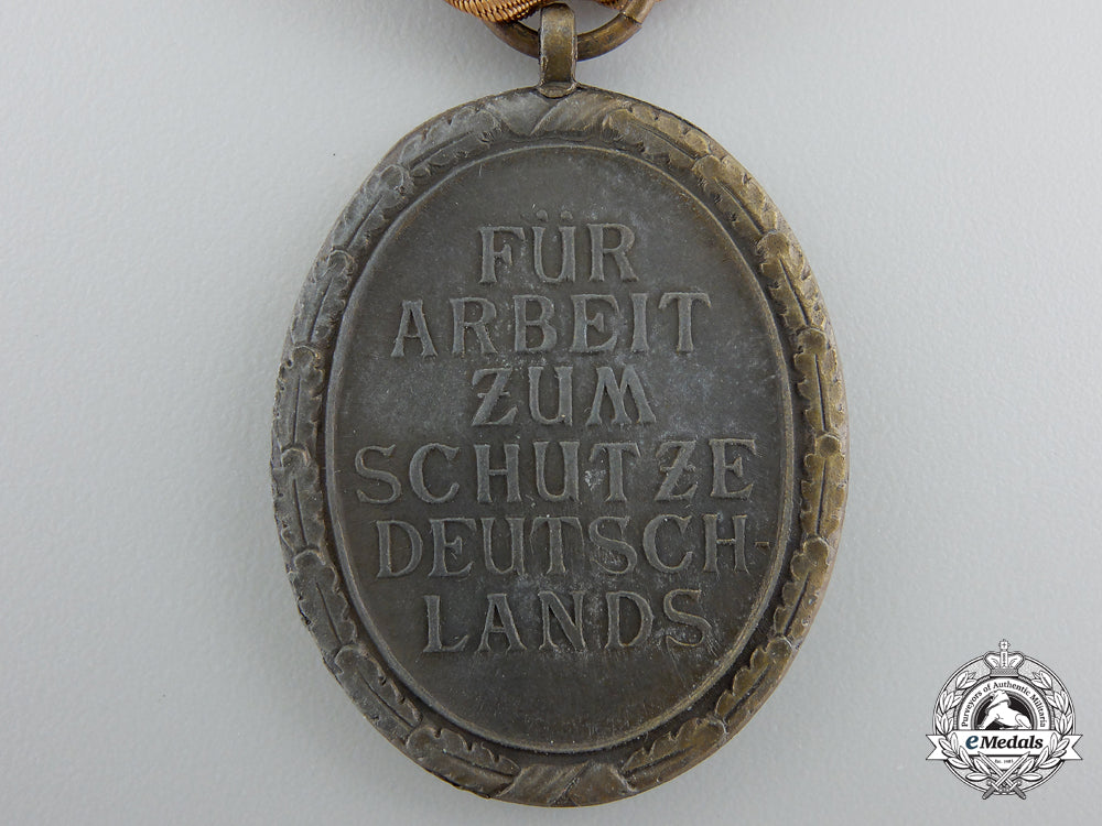 a_west_wall_medal_with_carl_poellath_packet_b_610