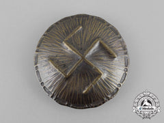 A Third Reich Period German Swastika Runic Badge