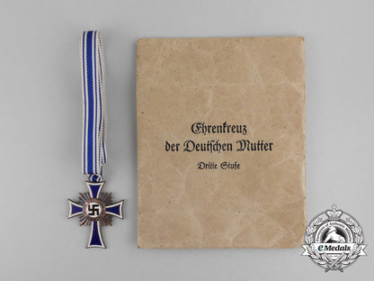 a_german3_rd_class_cross_of_honour_of_the_german_mother_with_its_packet_by_ernst&_müller_bb_2401