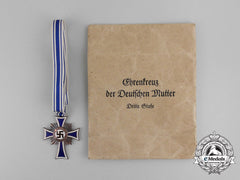 A German 3Rd Class Cross Of Honour Of The German Mother With Its Packet By Ernst & Müller