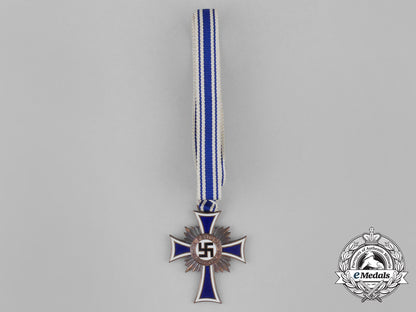 a_german3_rd_class_cross_of_honour_of_the_german_mother_with_its_packet_by_ernst&_müller_bb_2402