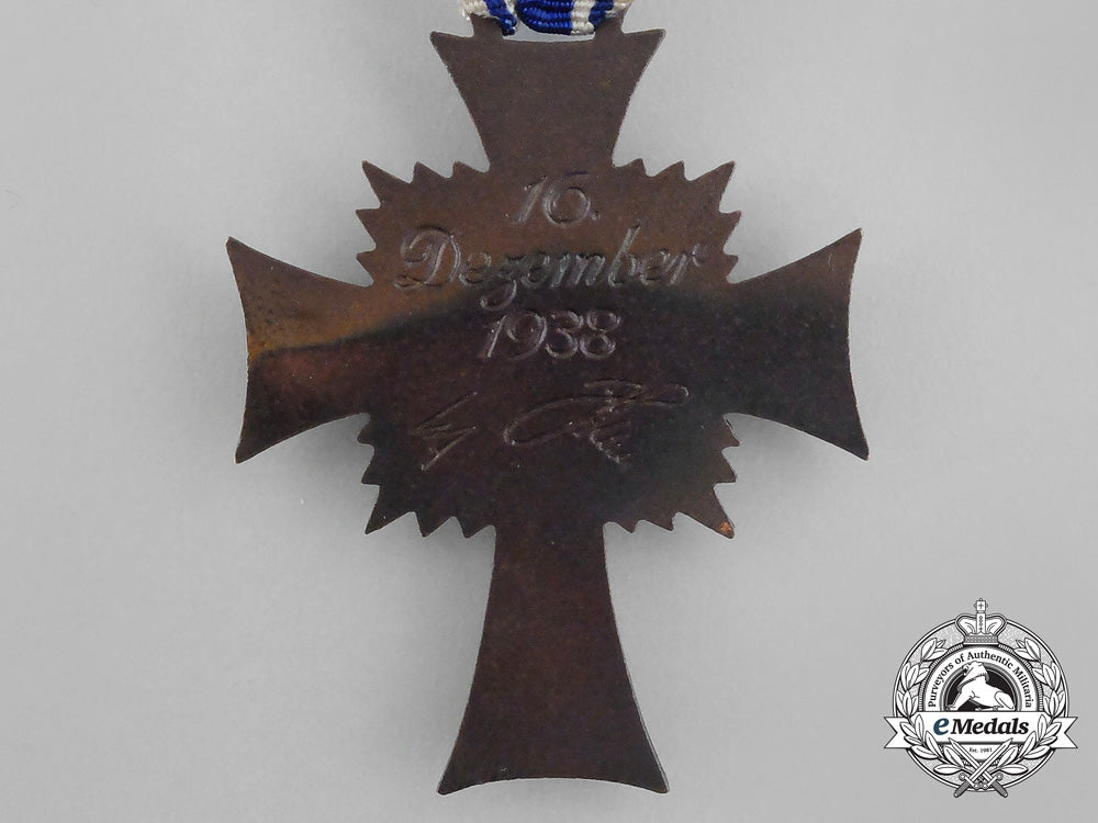 a_german3_rd_class_cross_of_honour_of_the_german_mother_with_its_packet_by_ernst&_müller_bb_2403