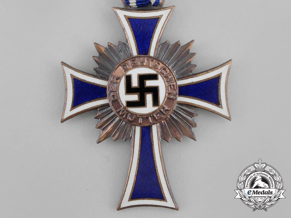 a_german3_rd_class_cross_of_honour_of_the_german_mother_with_its_packet_by_ernst&_müller_bb_2404