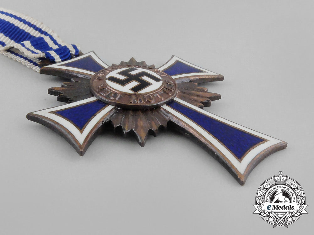 a_german3_rd_class_cross_of_honour_of_the_german_mother_with_its_packet_by_ernst&_müller_bb_2405