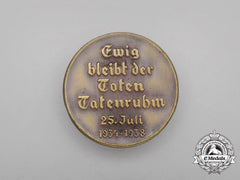 A 1938 “Forever Remains The Glory Of The Dead” Badge