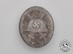 A Silver Grade Wound Badge By Carl Wild