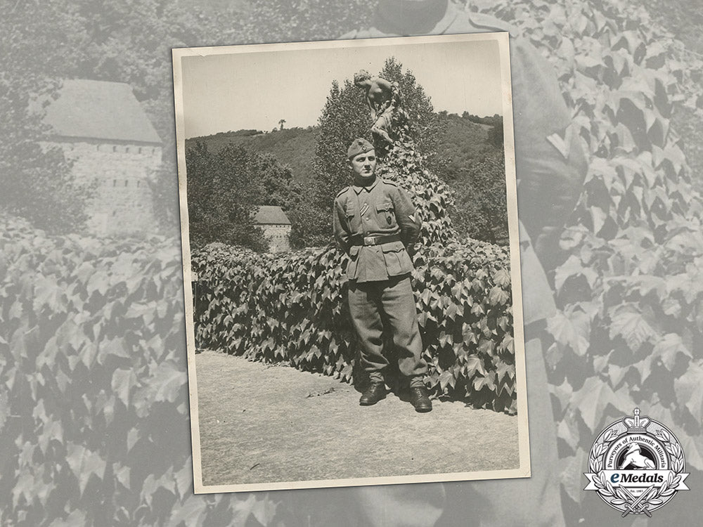 germany,_heer._a_large1943_photo_of_obergefreiter(_ek2,_wound_badge)_with_dedication_to_wife_c17-183_2