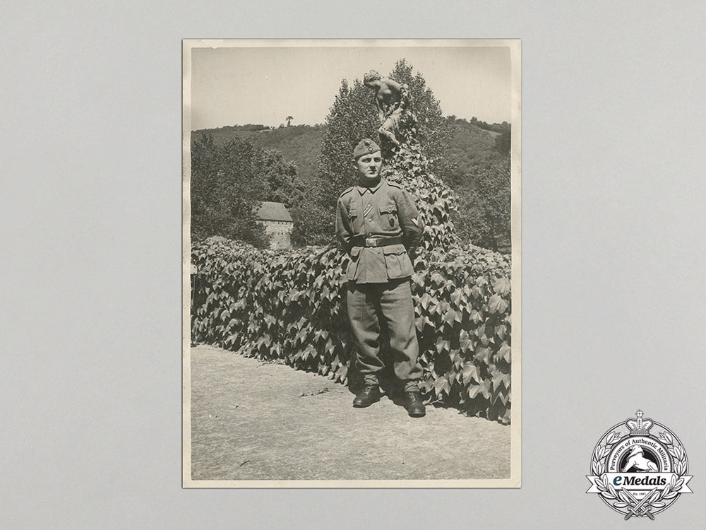 germany,_heer._a_large1943_photo_of_obergefreiter(_ek2,_wound_badge)_with_dedication_to_wife_c17-184_2