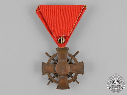 hungary,_regency._order_of_the_holy_crown,_bronze_cross_with_wd_and_swords,1943_c18-018537