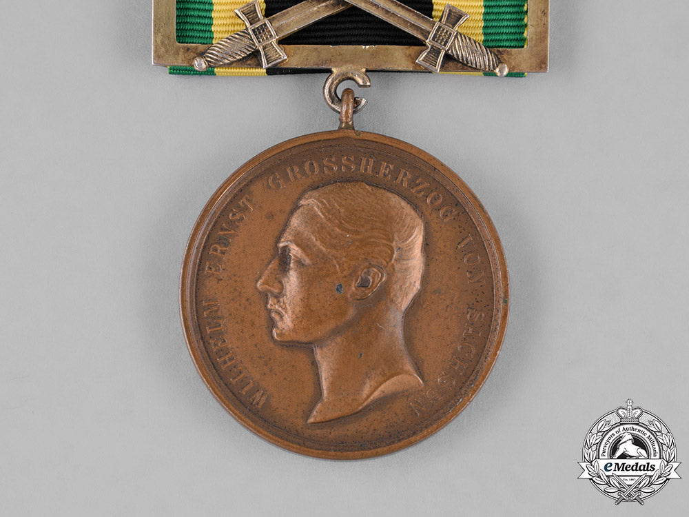 saxony,_kingdom._a_general_medal_of_merit,_bronze_grade,_with_sword_clasp_c18-023557