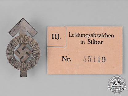 germany._an_hj_proficiency_badge,_silver_grade,_with_its_original_paper_packet_of_issue_c18-026261