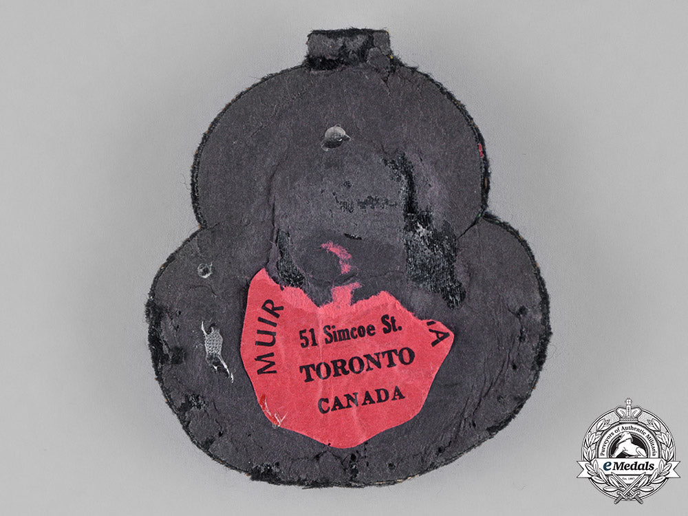 canada._a_royal_canadian_air_force(_rcaf)_officer's_cap_badge,_c.1941_c18-031810