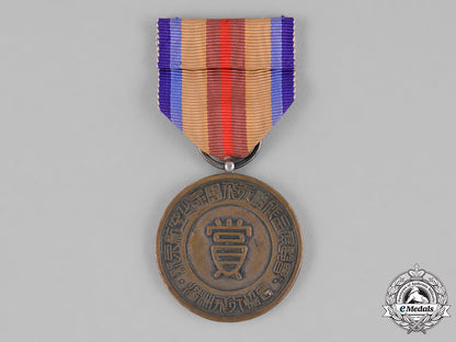 japan,_occupied_manchukuo._a_hsinking_flight_academy_association_merit_medal,_c.1940_c18-032270
