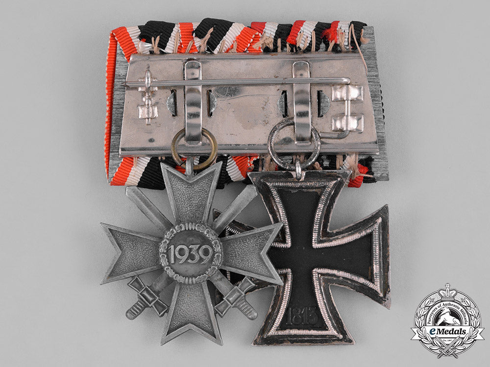 germany,_third_reich._an_iron_cross1939,_ii_class,_and_war_merit_cross_with_swords_medal_bar_c18-036144