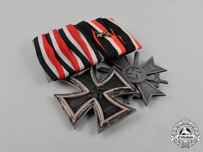 germany,_third_reich._an_iron_cross1939,_ii_class,_and_war_merit_cross_with_swords_medal_bar_c18-036145