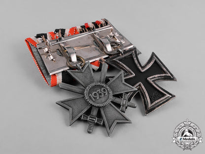 germany,_third_reich._an_iron_cross1939,_ii_class,_and_war_merit_cross_with_swords_medal_bar_c18-036146