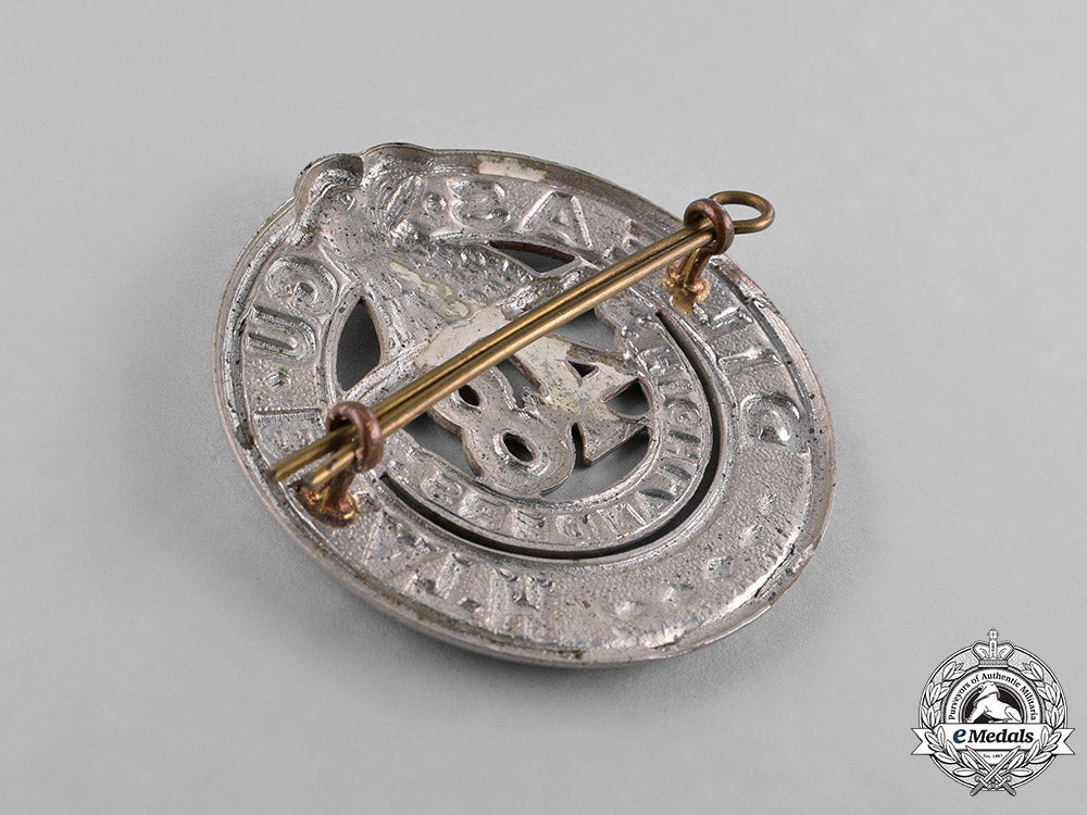 canada._a_lot_of_three_second_war_cap_badges_c18-037982