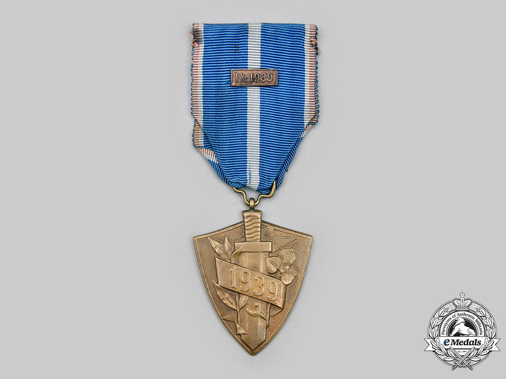 slovakia,_i_republic._a_defence_of_slovakia_medal,_type_i_with_award_document_c2020_135_mnc1432