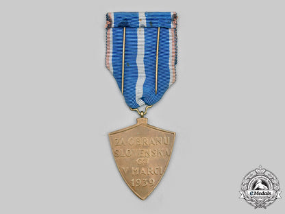 slovakia,_i_republic._a_defence_of_slovakia_medal,_type_i_with_award_document_c2020_136_mnc1434