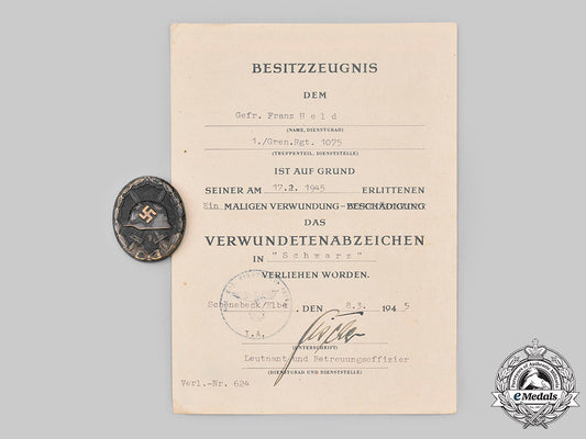 germany,_heer._a_black_grade_wound_badge,_with_award_document,_to_gefreiter_franz_held_c2020_362_mnc4774