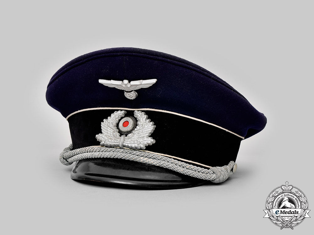 germany,_reichsbahn._a_bahnschutzpolizei_officer’s_upgraded_visor_cap,_by_negele_c2020_639_mnc4137_1_1