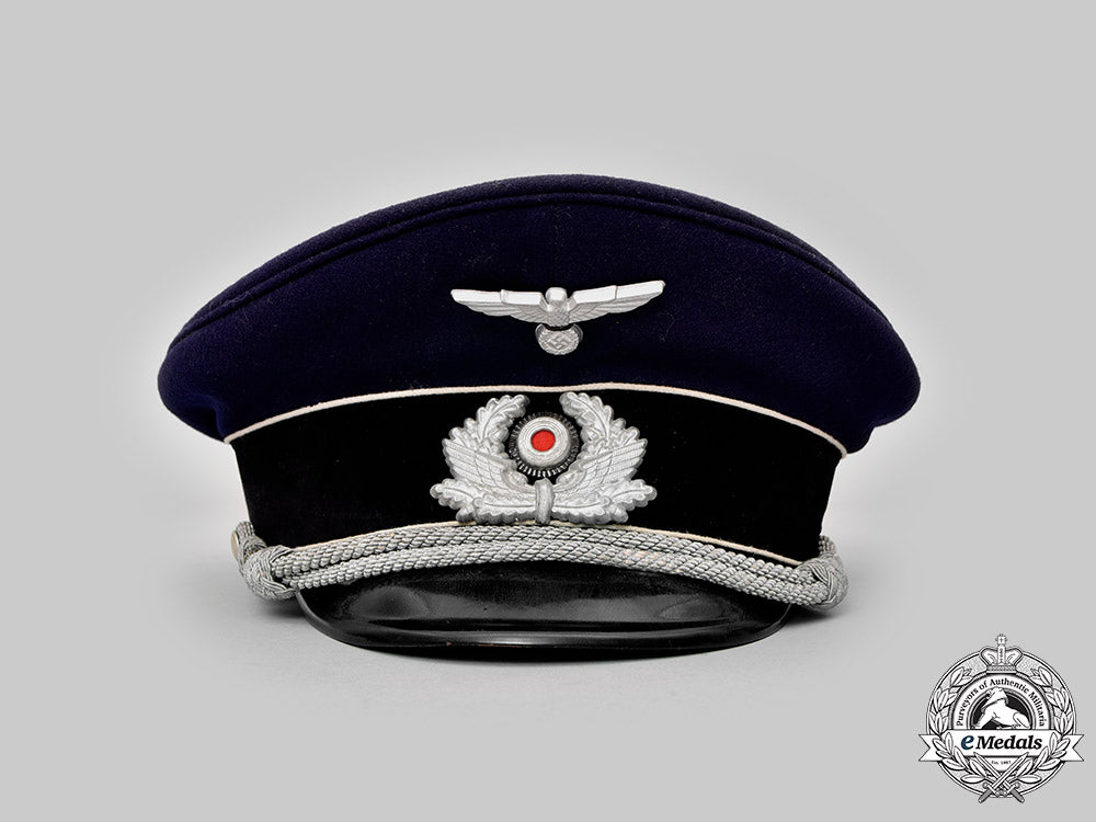 germany,_reichsbahn._a_bahnschutzpolizei_officer’s_upgraded_visor_cap,_by_negele_c2020_640_mnc4139_1_1