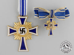 A German Gold Grade Mother’s Cross With Miniature