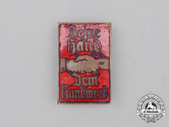 A Fine Quality National Socialist Hago “Deine Hand Dem Handwerk” Badge; Marked